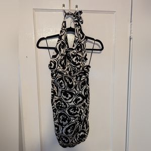 Black and white backless mini dress by Italian designer Flavio Castellani